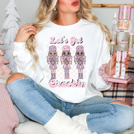 Retro Lets Get Crackin Nutcracker sweatshirt. Pink and purple girly Christmas nutcrackers.