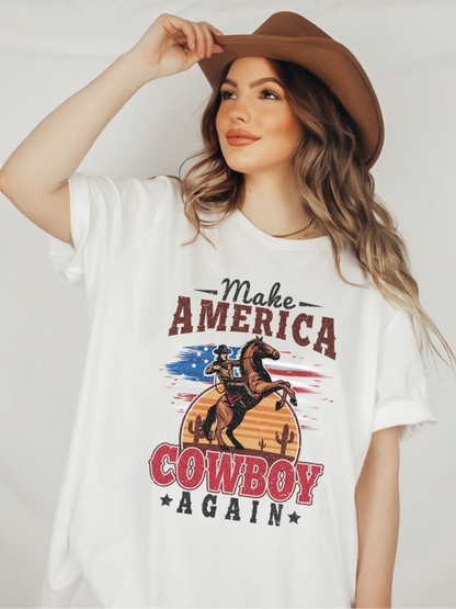 Model wearing white bella canvas tshirt with distressed western make america cowboy again print