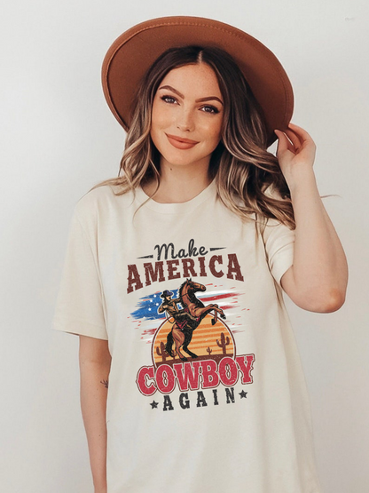Model wearing natural bella canvas tshirt with distressed western make america cowboy again print